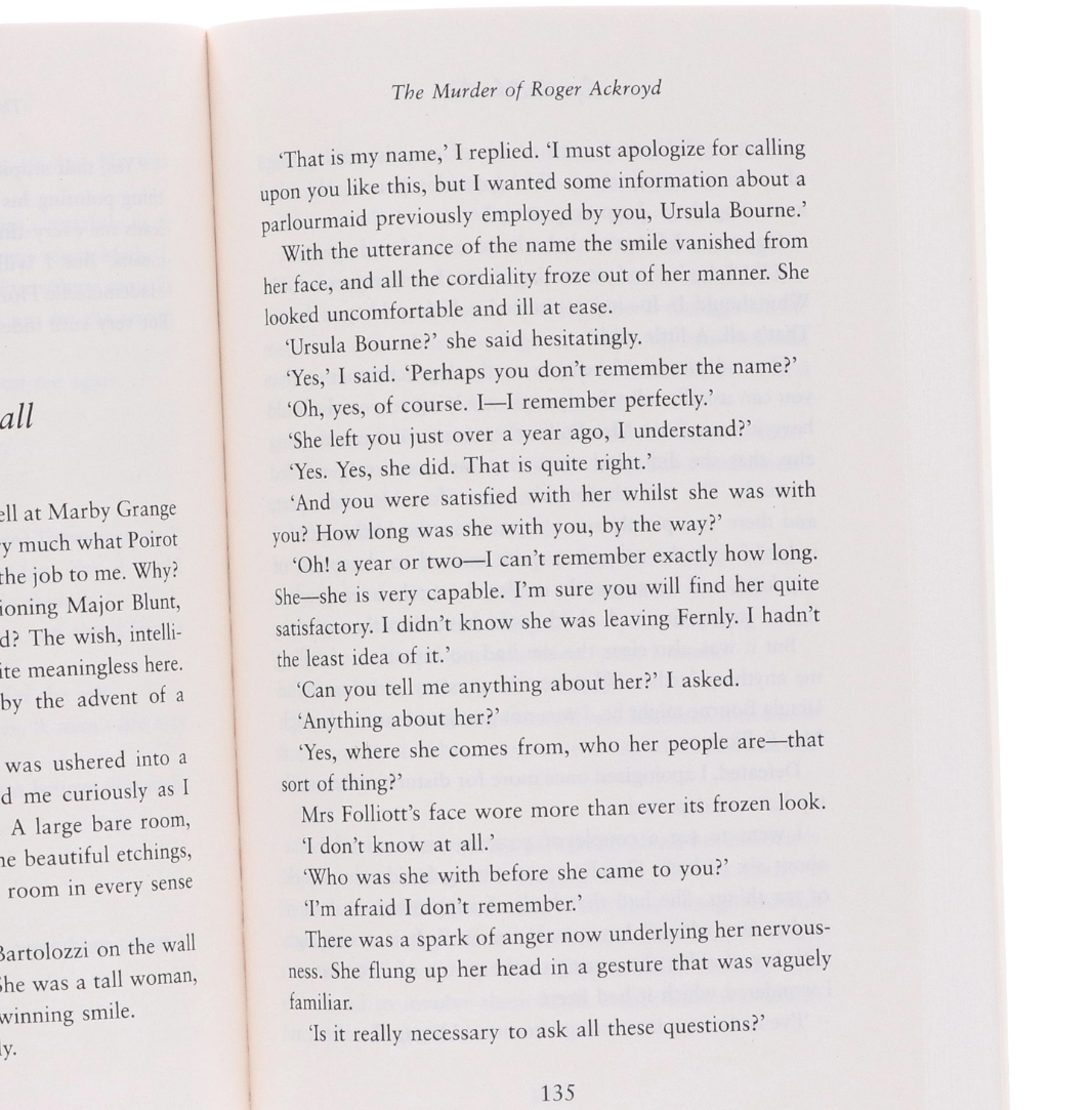 A single printed page from a book, showing the interior text of 'The Murder of Roger Ackroyd' by Agatha Christie, photographed against a white background.
