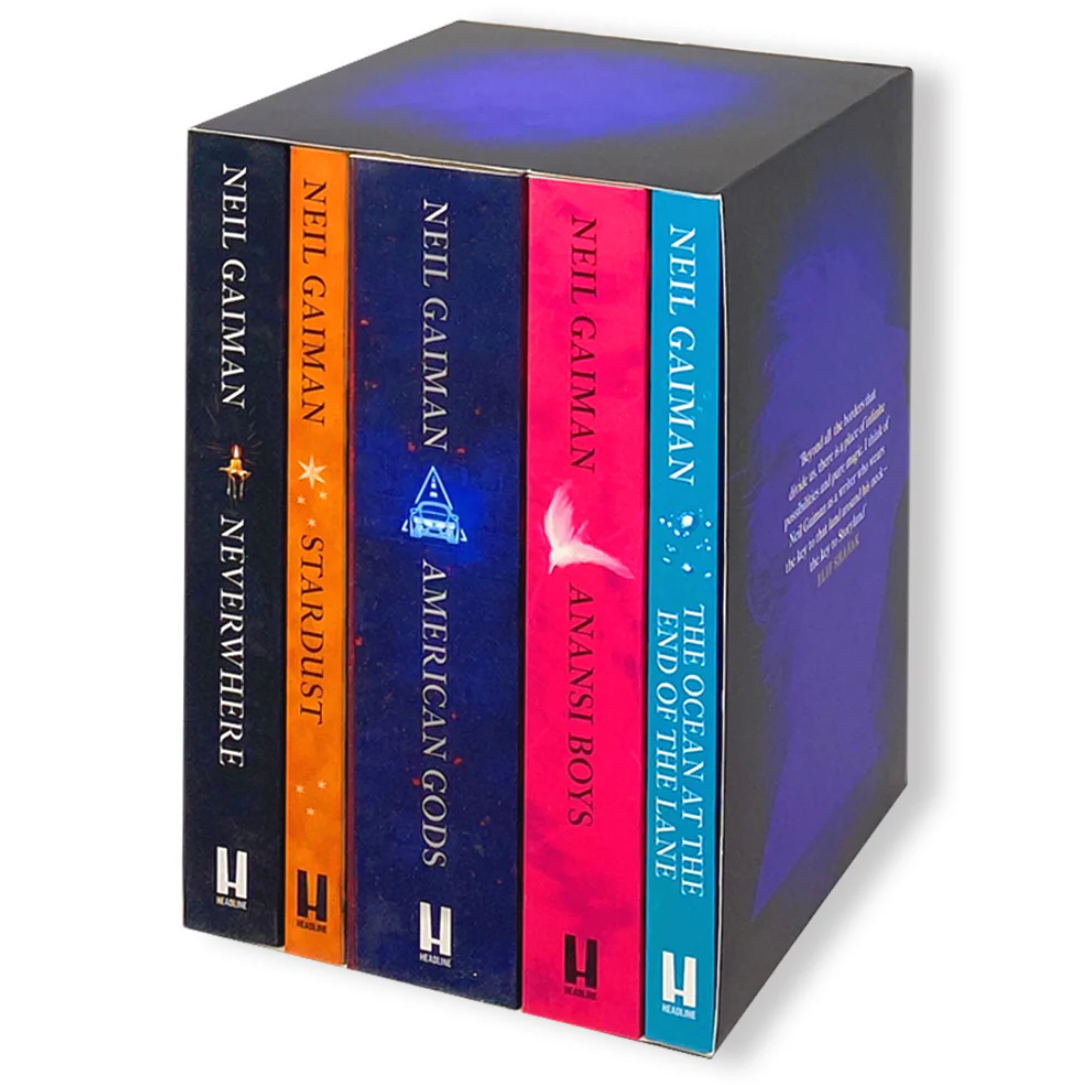 Collection of Neil Gaiman books in a box set with colorful spines.