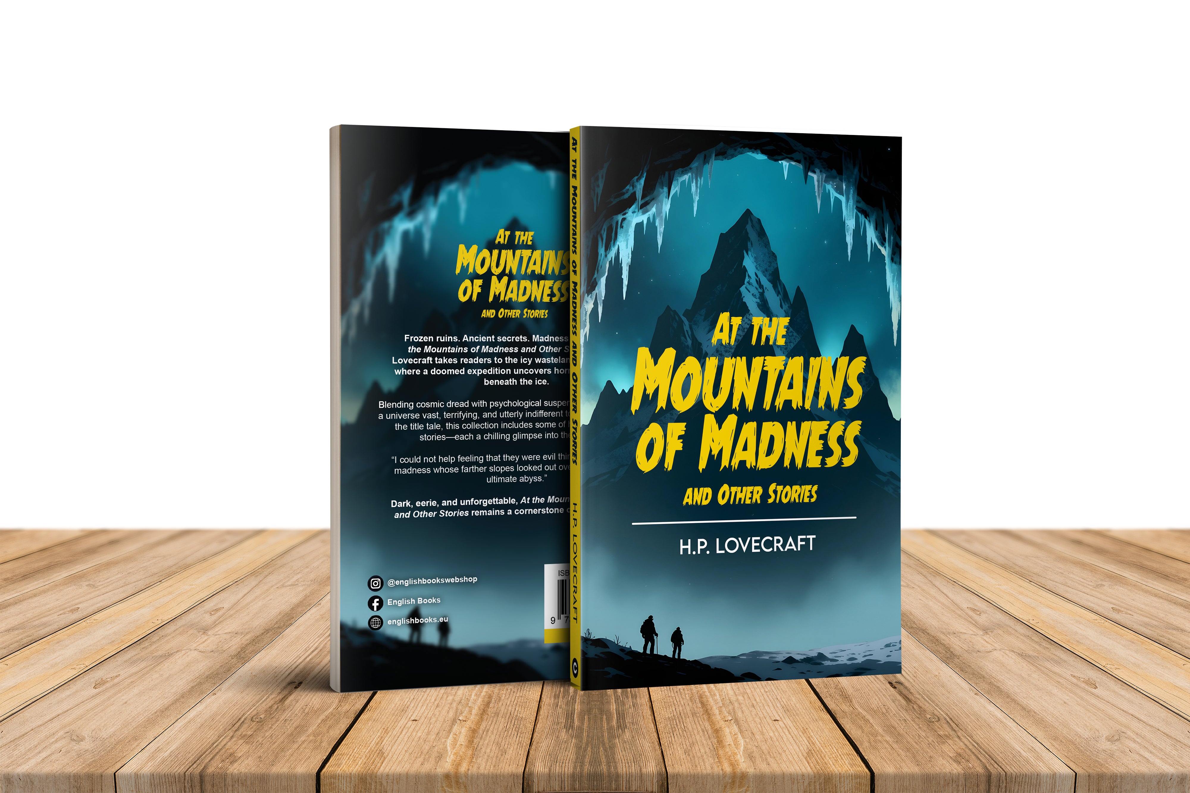 Book titled 'At the Mountains of Madness' by H.P. Lovecraft on a wooden surface