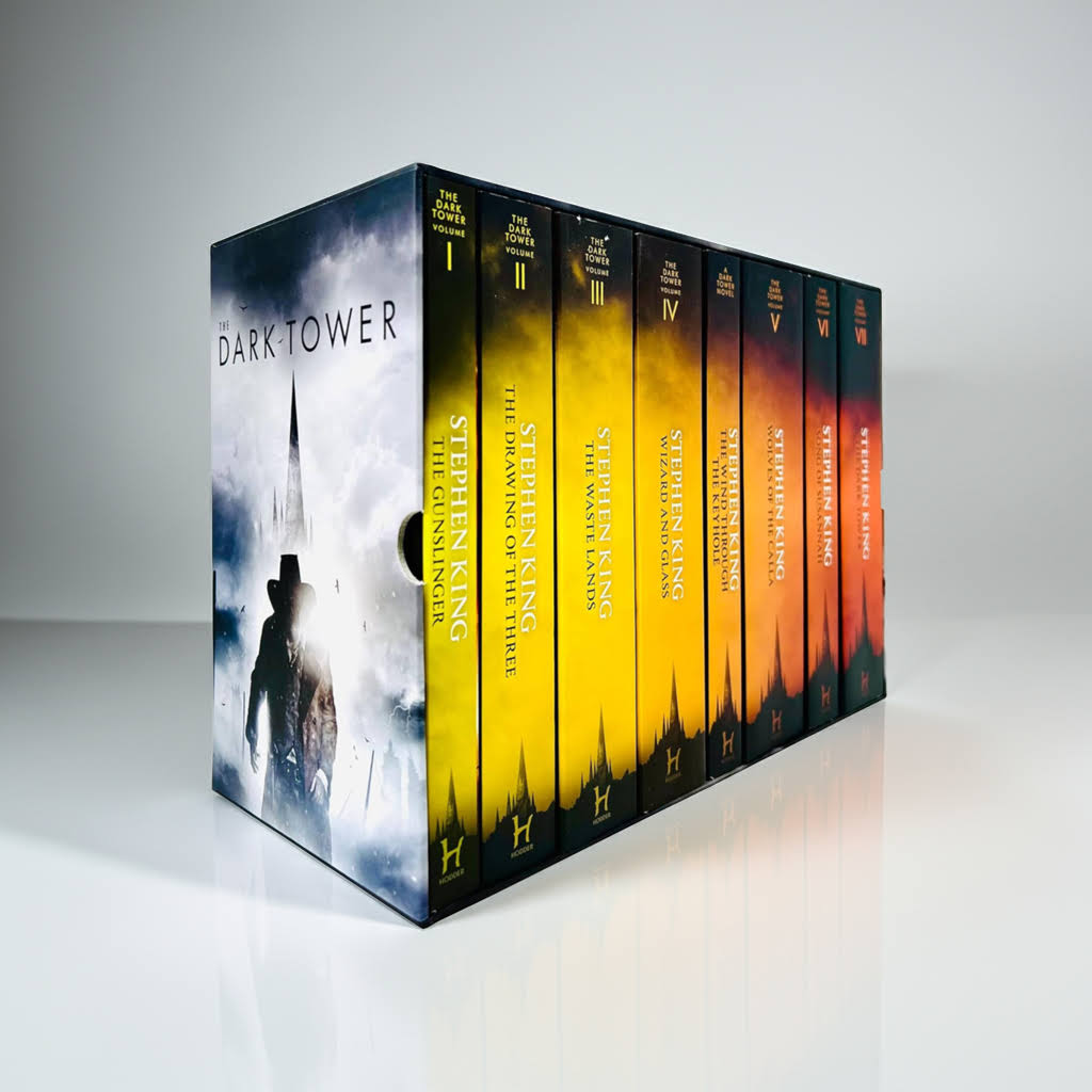 The Dark Tower Series Complete 8 Book Box Set by Stephen King with visible spine designs on a white studio background