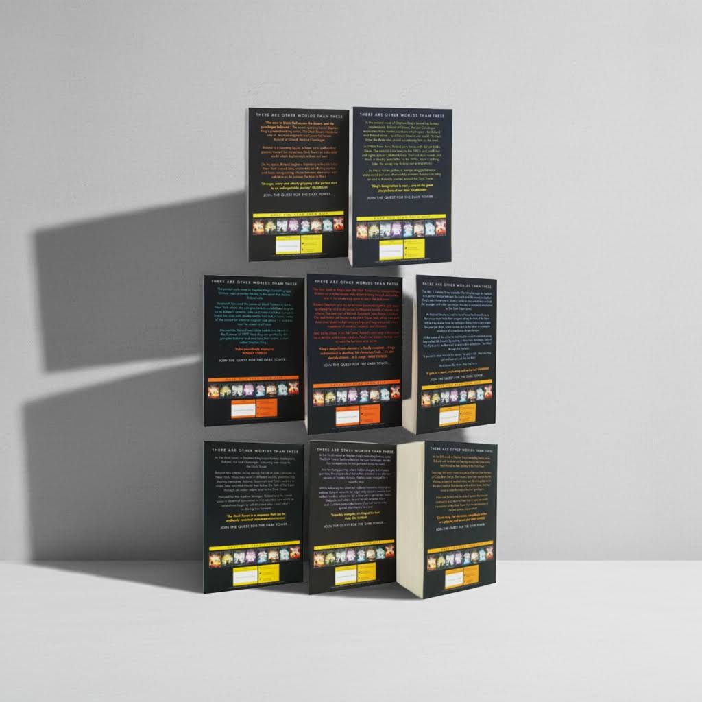 Back covers of The Dark Tower Series 8 Book Box Set by Stephen King, displayed in a pyramid stack on a white studio background