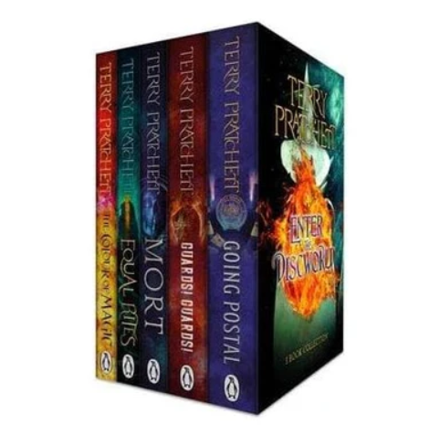 Collection of Terry Pratchett books in a box set on a white background
