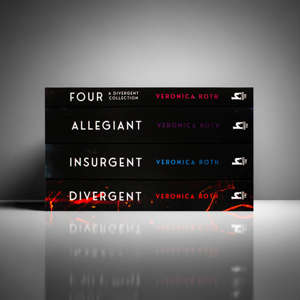 Side view of the Divergent Series Box Set by Veronica Roth, displaying all four book spines—Divergent, Insurgent, Allegiant, and Four—on a clean white studio surface with soft shadows