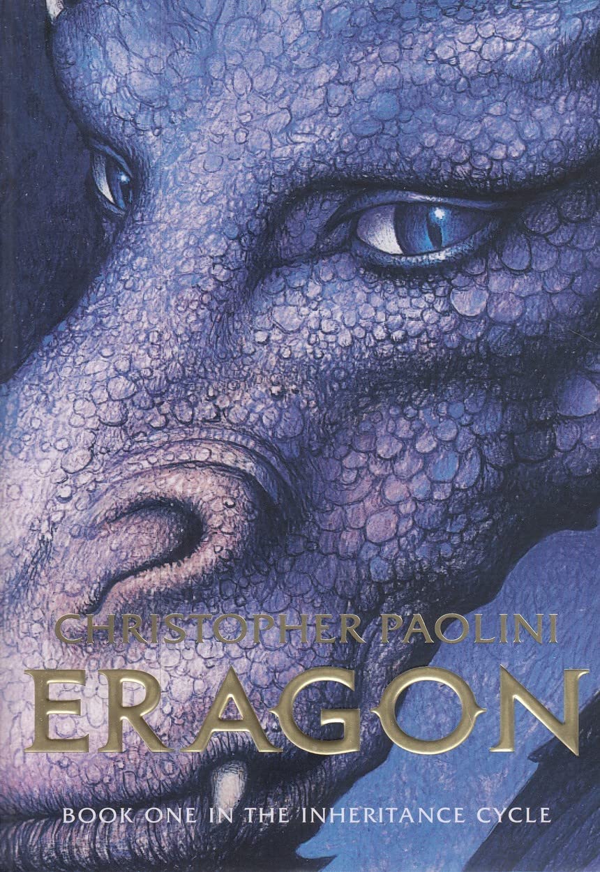 Cover of 'Eragon (Inheritance, Book 1)' featuring a close-up image of a dragon's face.