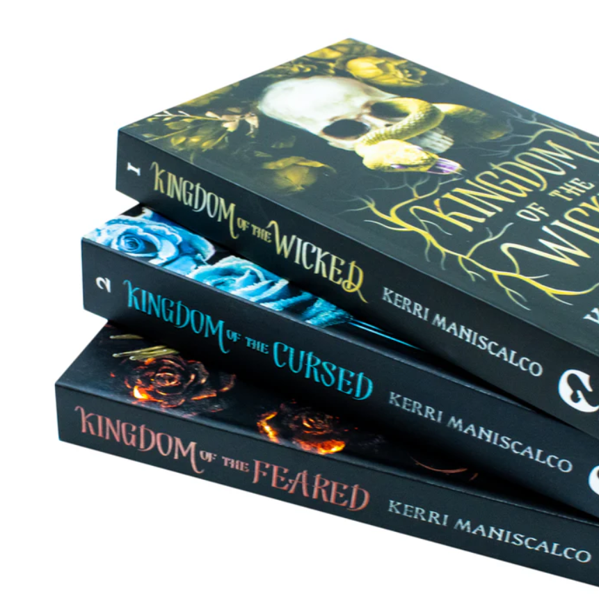 Three books titled 'Kingdom of the Wicked', 'Kingdom of the CurSED', and 'Kingdom of the Feared' by Kerri Maniscalco on a white background.