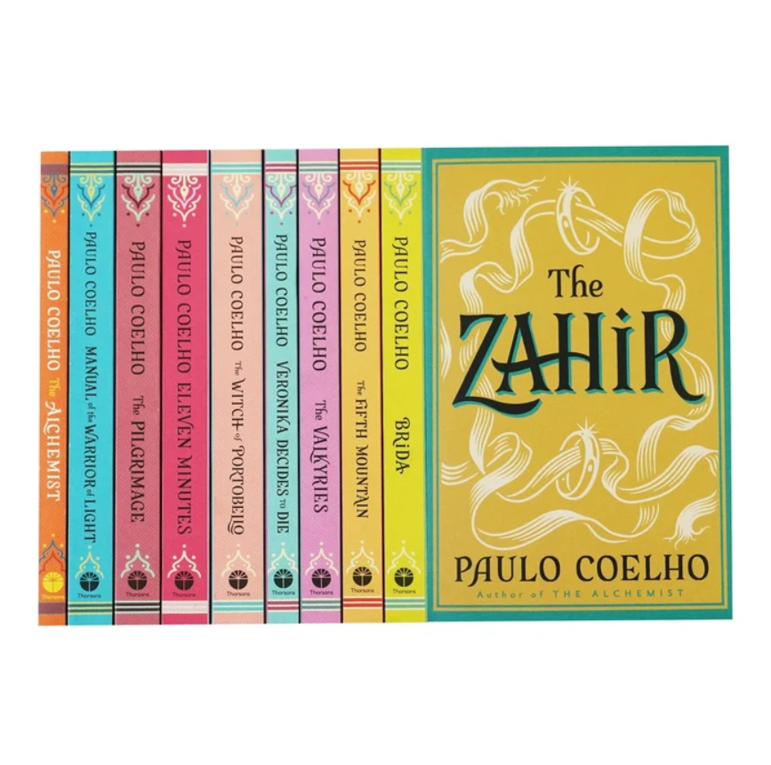 The Zahir book series set by Paulo Coelho, featuring ten colorful book spines and the front cover of 'The Zahir' on a plain white background.