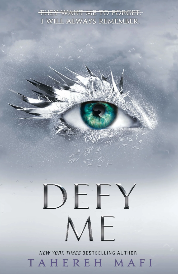 Book cover of 'Defy Me' by Tahereh Mafi featuring an eye with a silver frame.