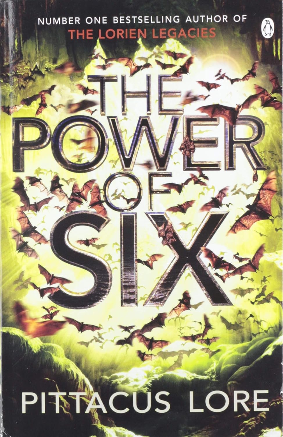 Book cover of 'The Power of Six' by Pittacus Lore with butterfly design