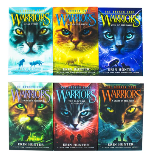 Set of six 'Warriors' books with colorful covers featuring cats.