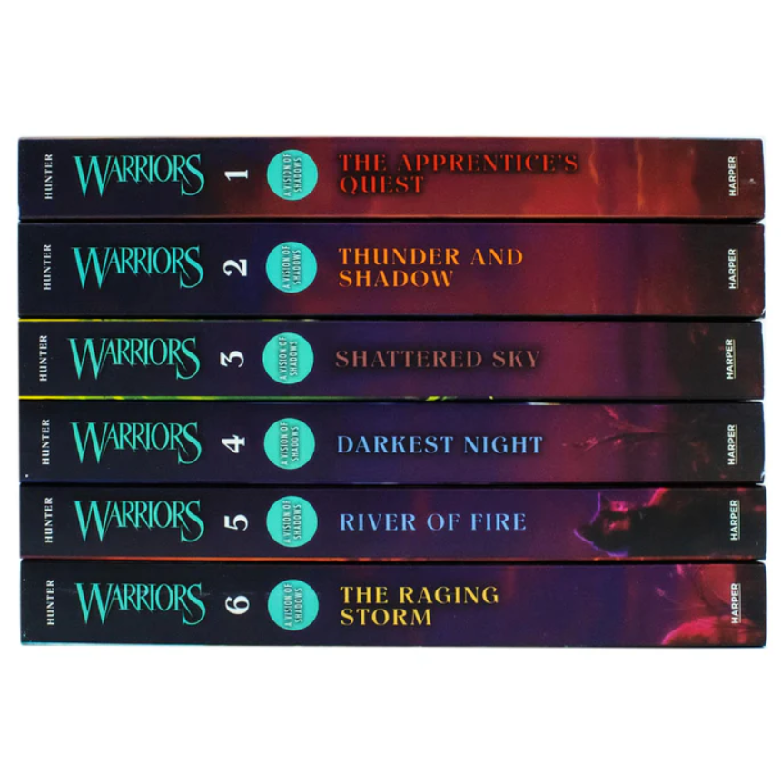 Stack of 'Warriors' book series on a white background