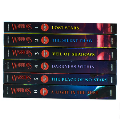 Stack of 'Warriors' book series on a white background