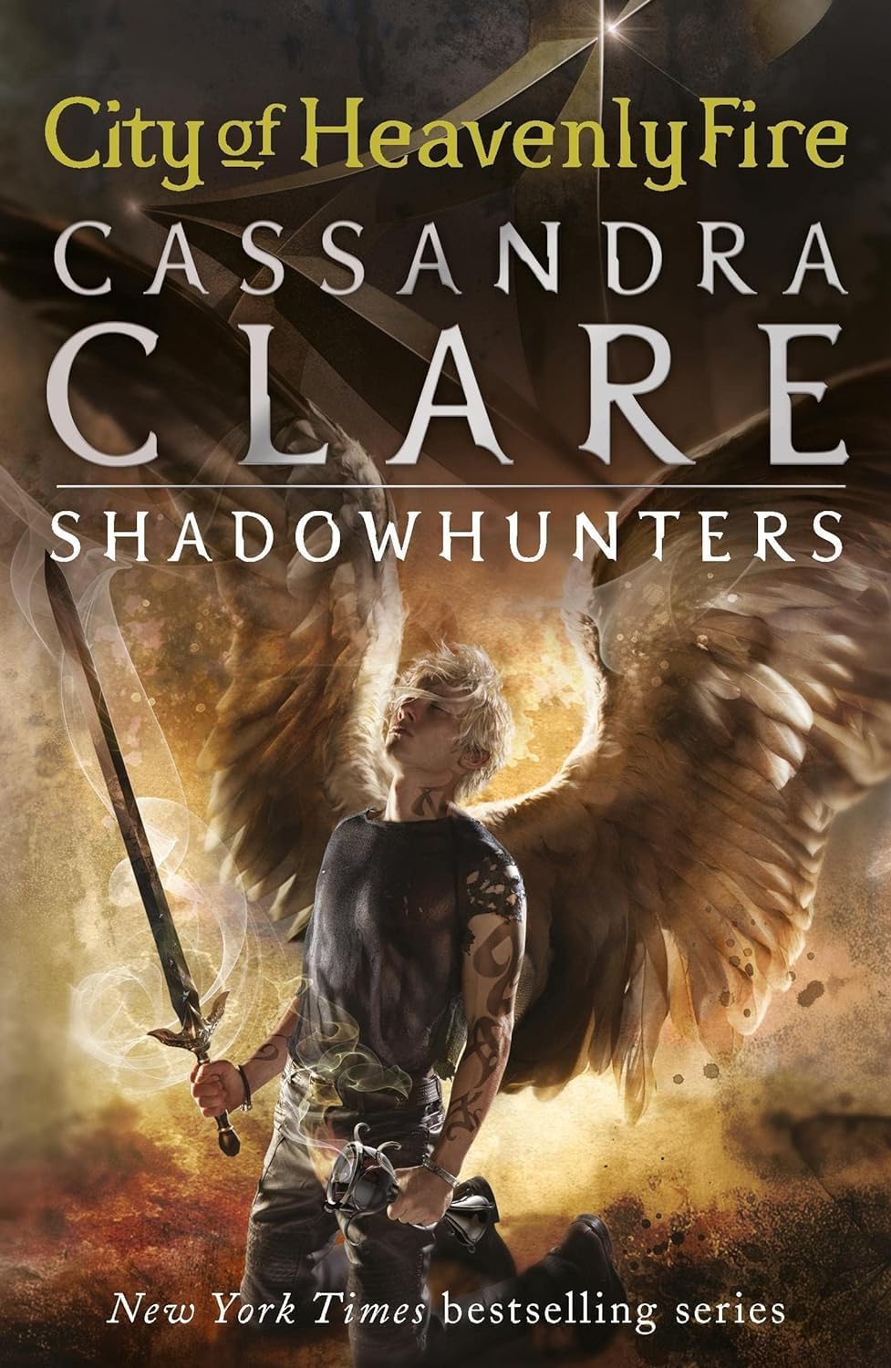 Book cover of 'City of Heavenly Fire' by Cassandra Clare featuring a character with wings and a sword.
