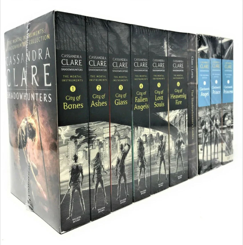 Collection of books by Cassandra Clare with silhouettes on the cover