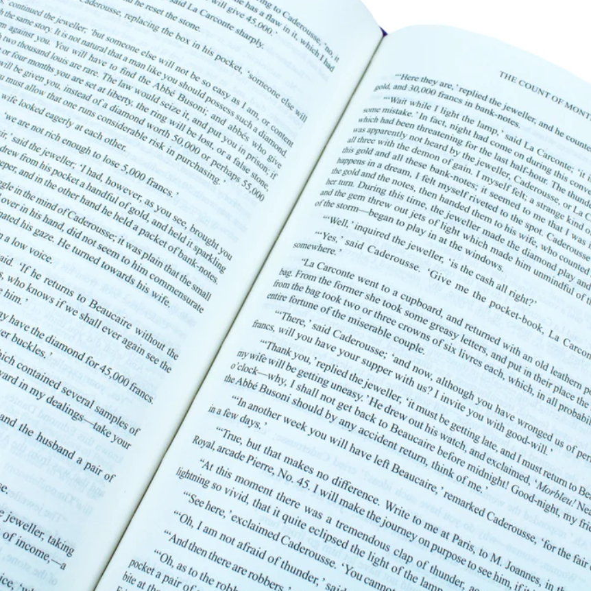 Open book with text on a white background