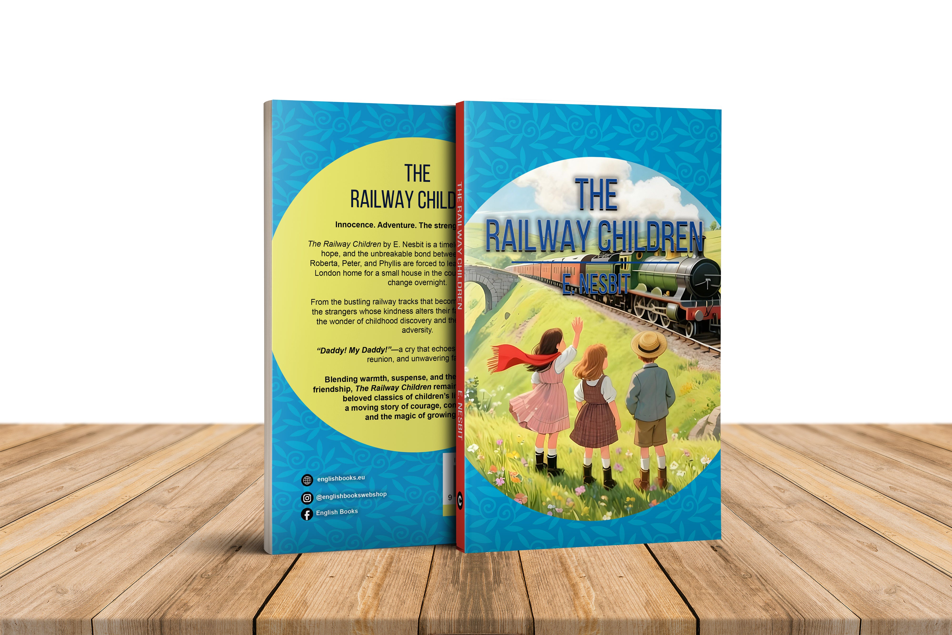 Book titled 'The Railway Children' on a wooden surface